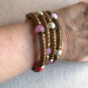 Memory wire wrap bracelet with pink and coral bead